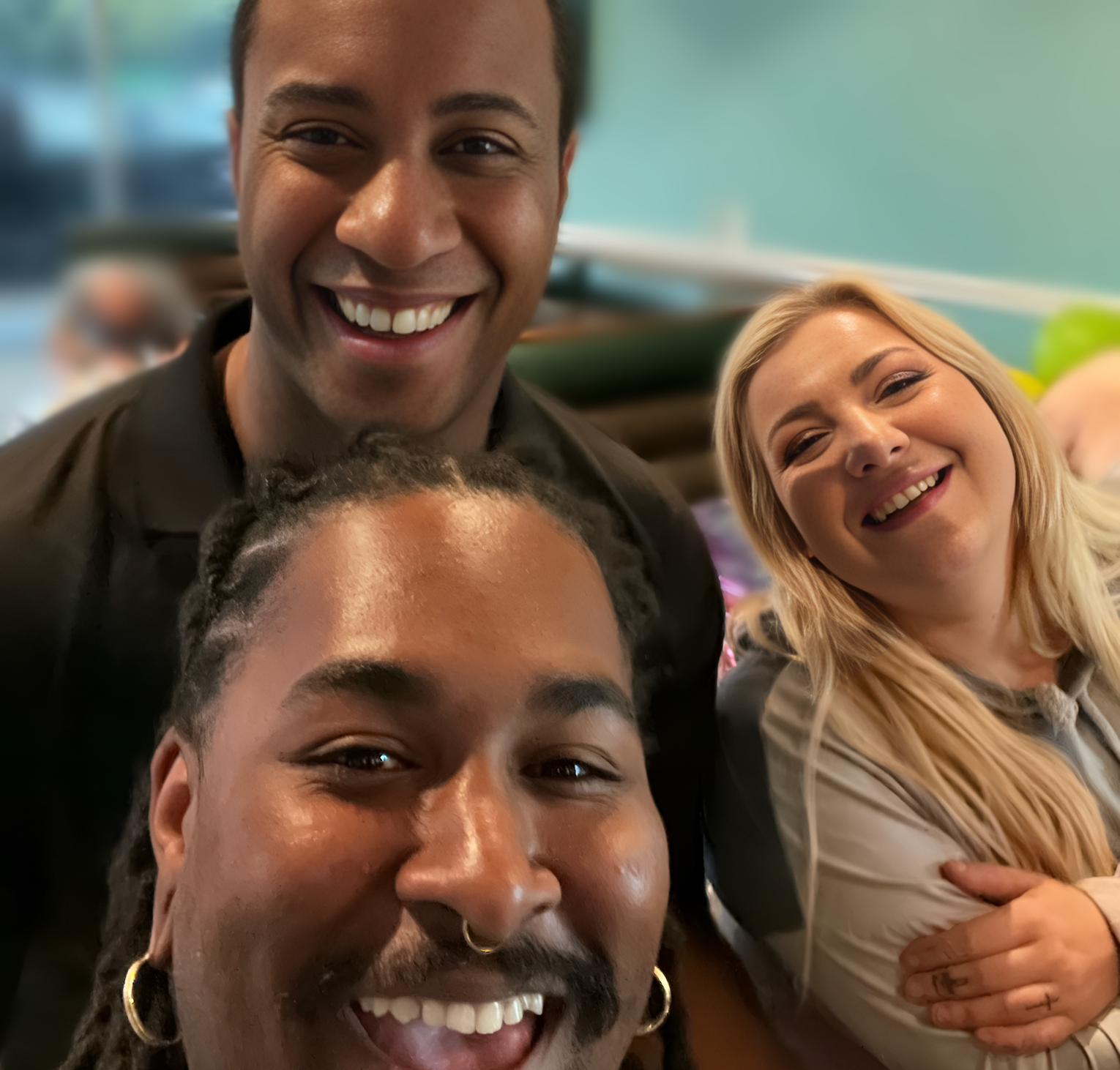 Three MKL regulars taking a selfie and enjoying the 5th anniversary